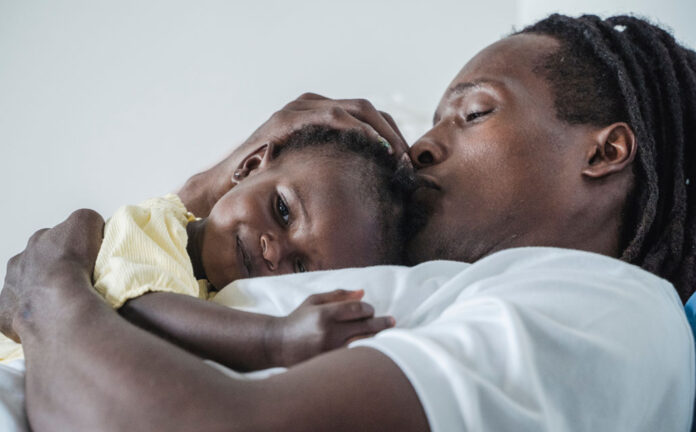 Father and daughter sharing a heartfelt embrace