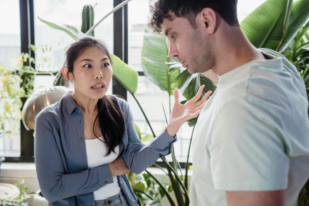 Man and woman arguing during a conversation