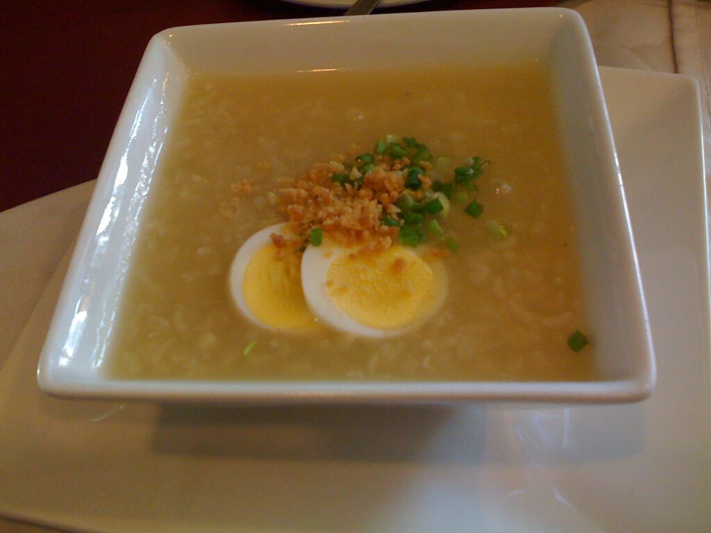 Lugaw with egg in a bowl