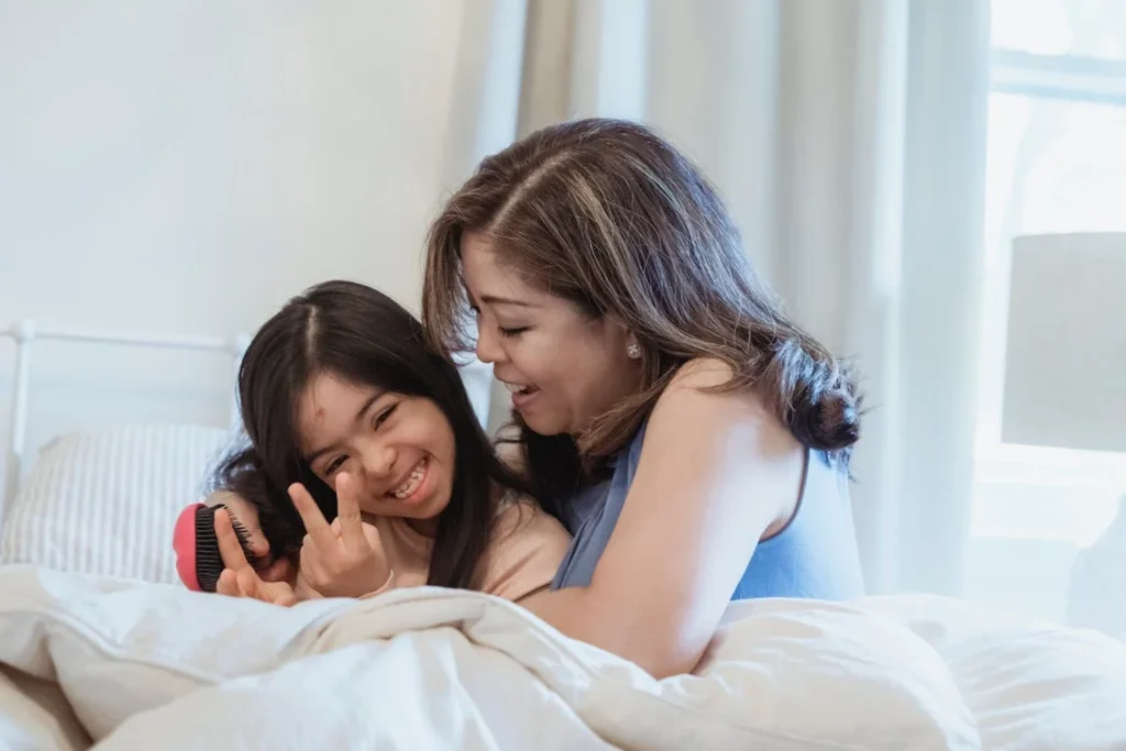 Mom and daughter sharing a heartfelt hug